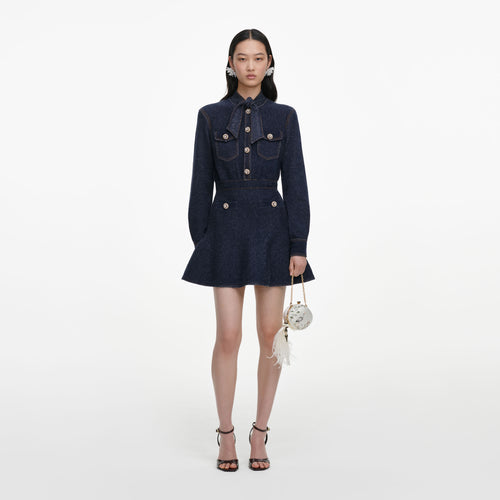 Front view of a woman wearing the Navy Textured Knit Mini Dress