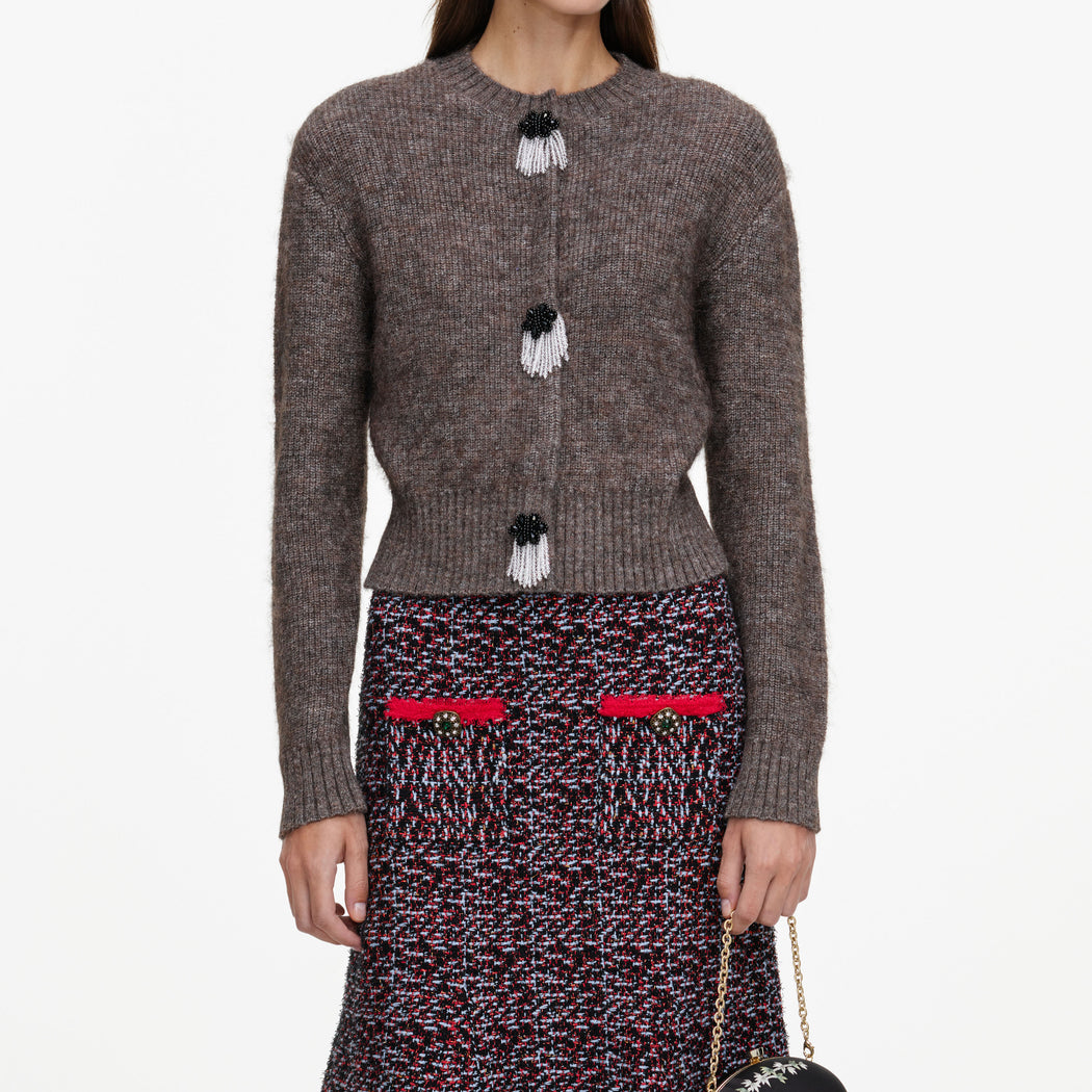 A close up of a woman wearing the Brown Fluffy Knit Cardigan