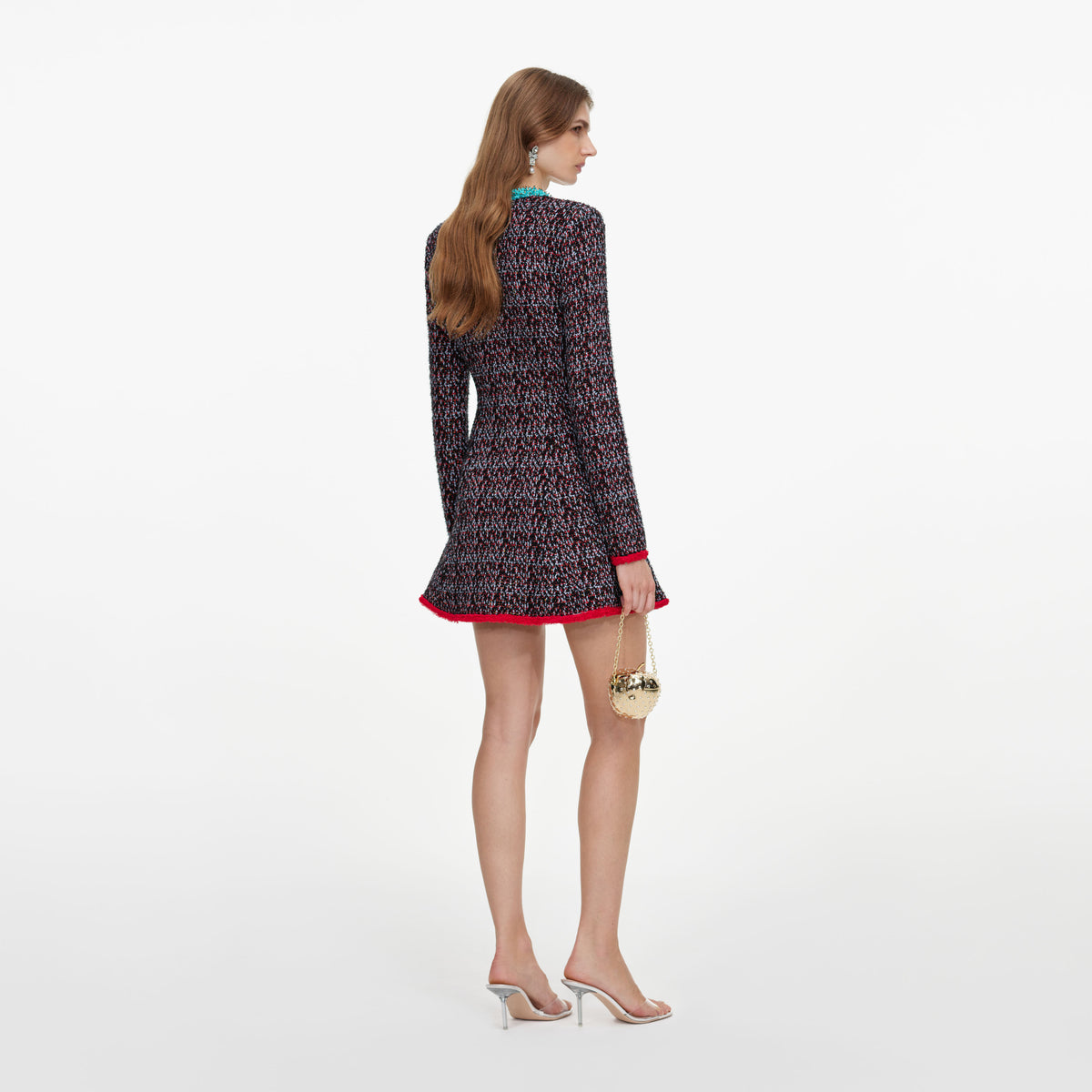 Back view of a woman wearing the Multi Textured Knit Mini Dress