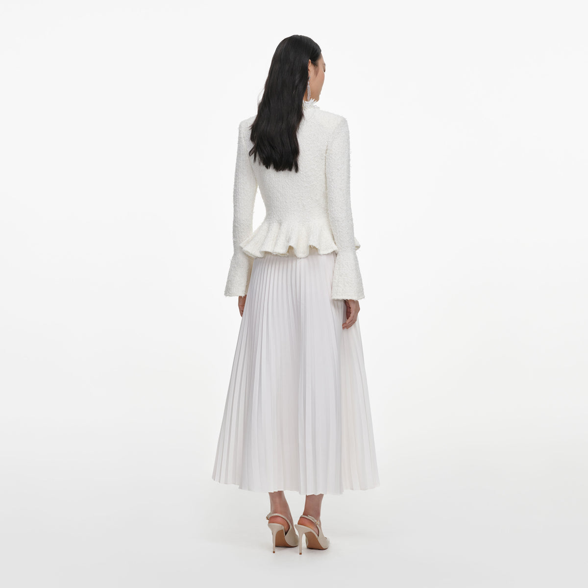 Back view of a woman wearing the White Textured Knit Chiffon Midi Dress