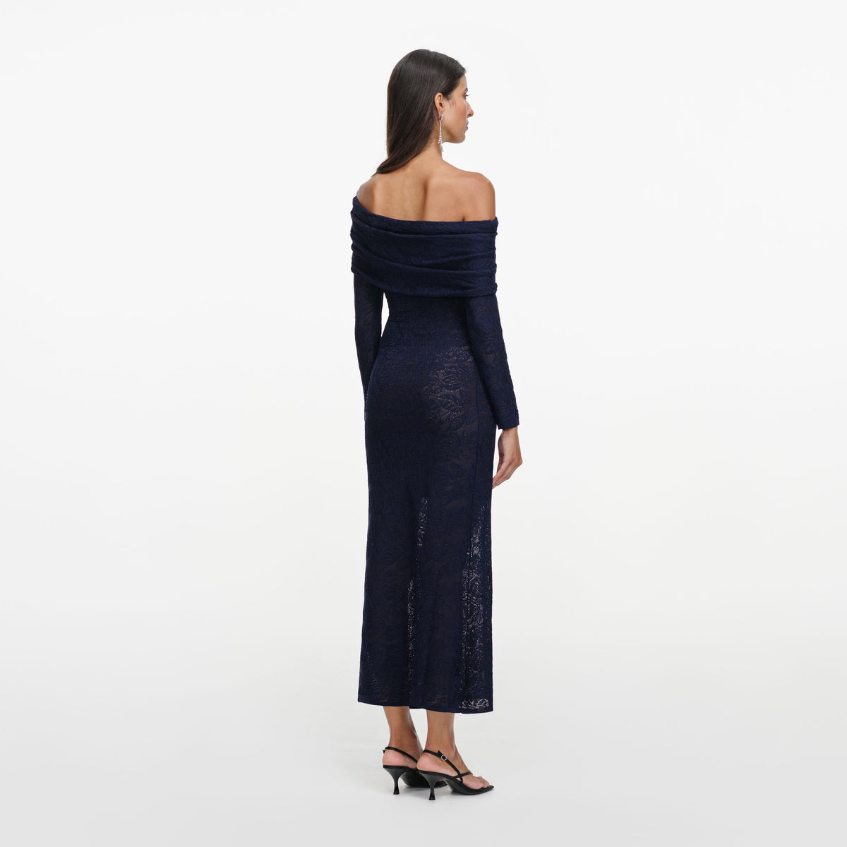 Back view of a woman wearing the Navy Jacquard Gathered Knit Midi Dress