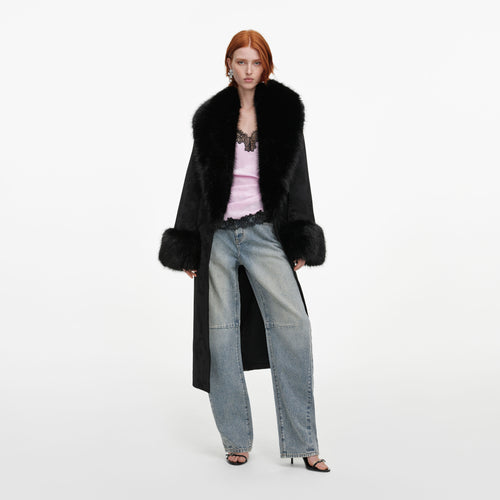 Front view of a woman wearing the Black Jacquard Fur Collar Coat