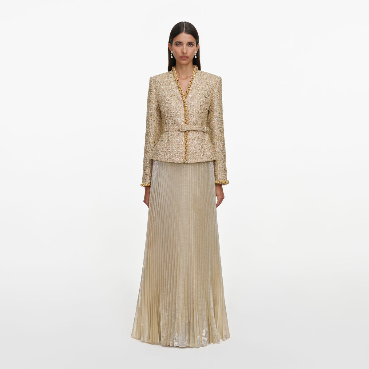 Front view of a woman wearing the Gold Boucle Pleated Maxi Dress