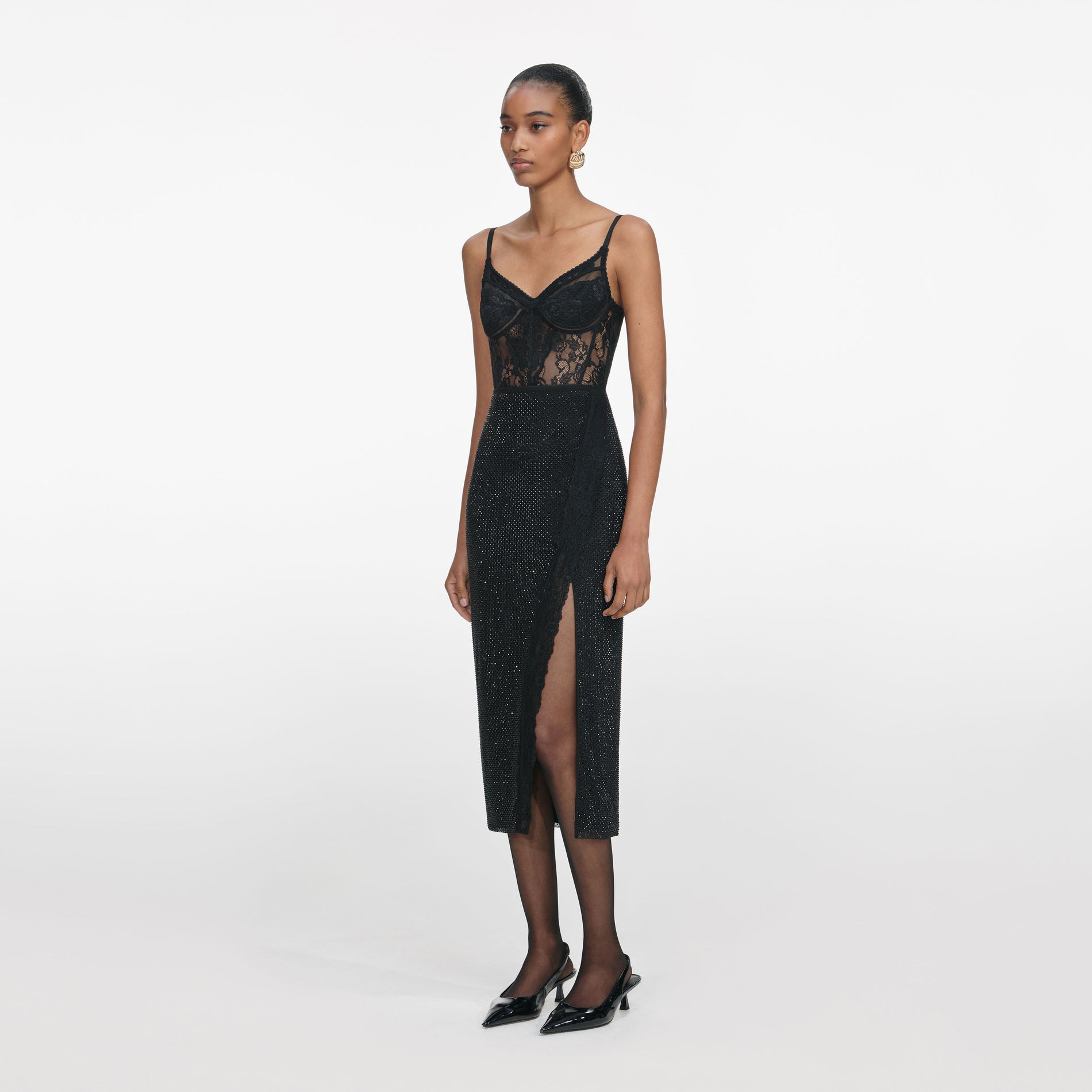 Side view of a woman wearing the Black Lace Strappy Top