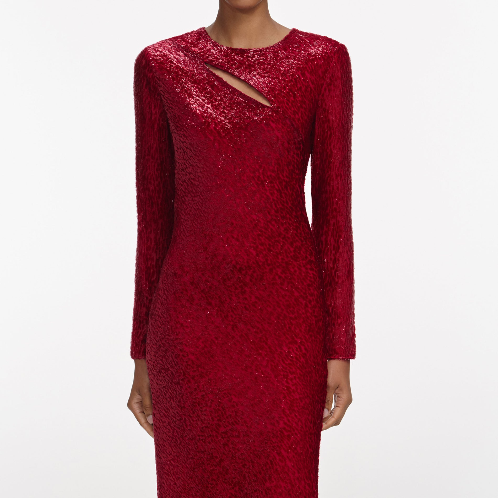 A close up of a woman wearing the Red Fil Coupe Midi Dress