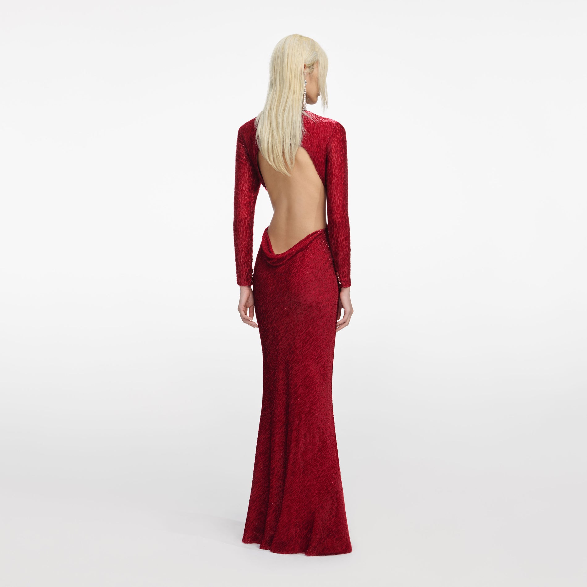 Back view of a woman wearing the Red Fil Coupe Maxi Dress