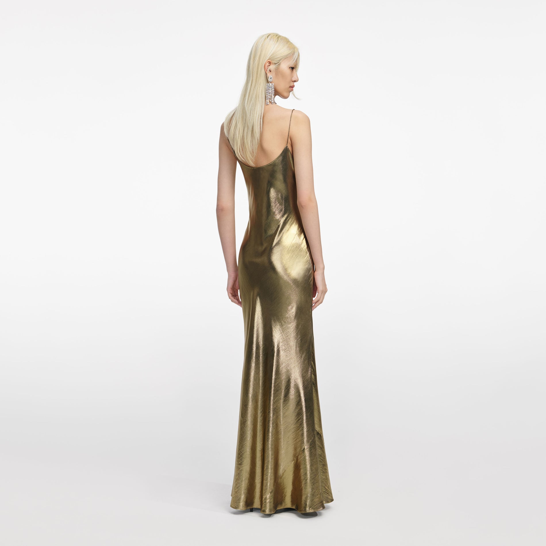 Back view of a woman wearing the Gold Metallic Strappy Maxi Dress