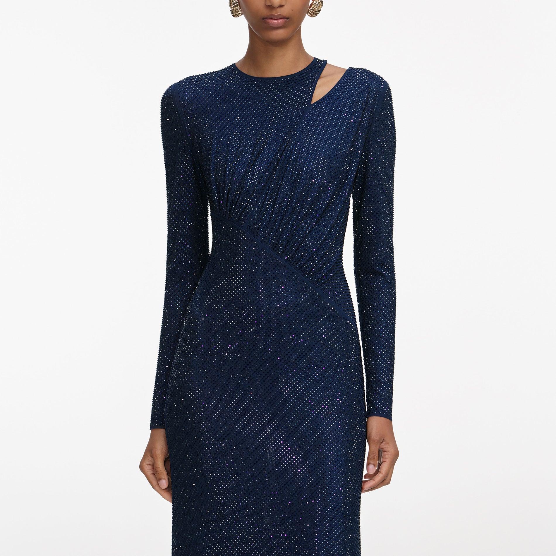 A close up of a woman wearing the Navy Rhinestone Mesh Cut Out Maxi Dress