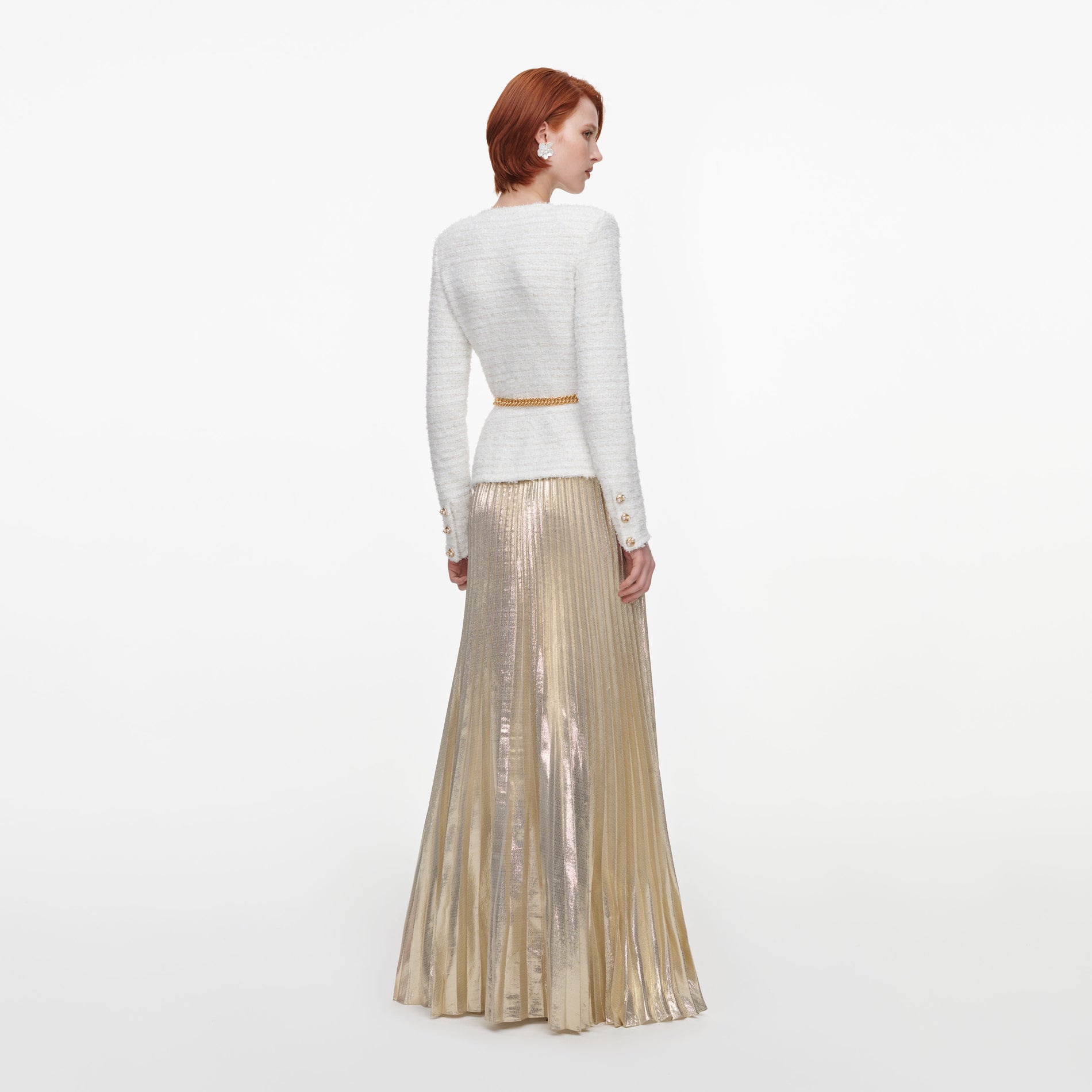 Back view of a woman wearing the Cream Textured Knit Metallic Chiffon Maxi Dress