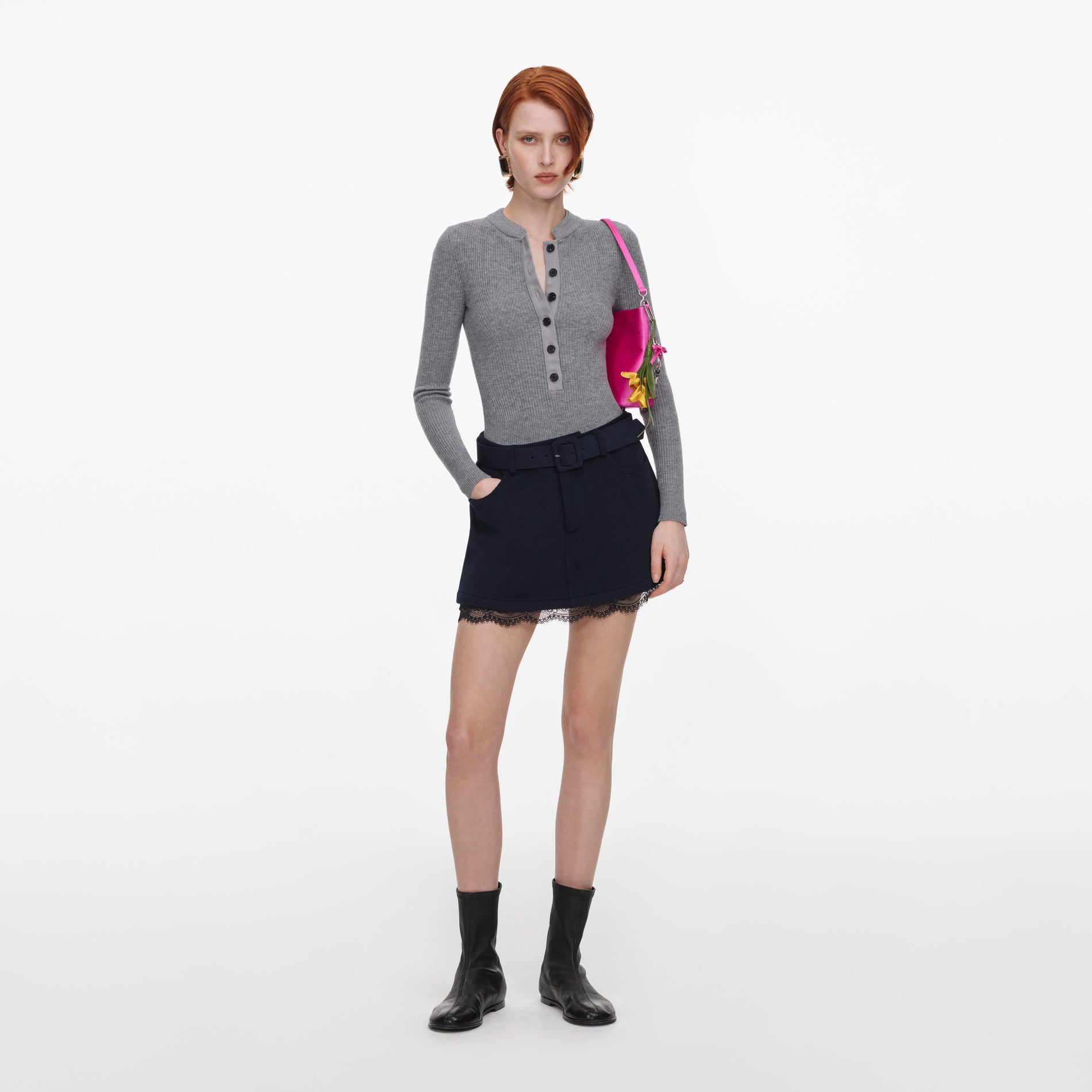 Front view of a woman wearing the Navy Wool Lace Skort