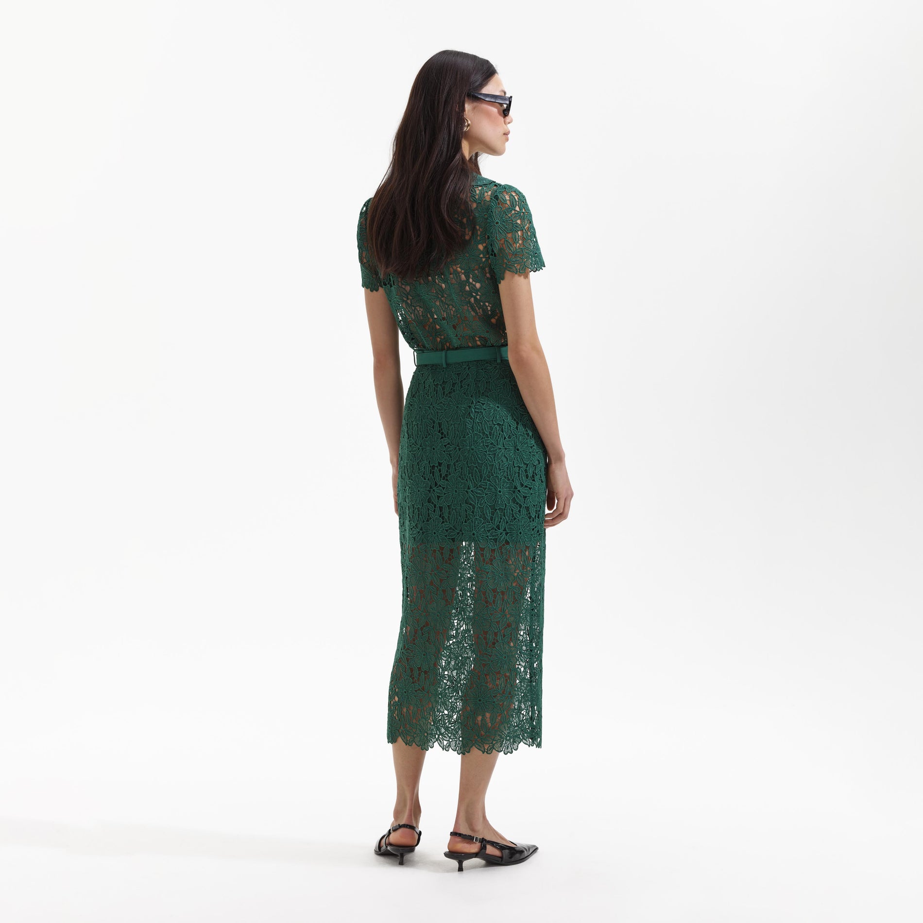 A Woman wearing the Green Guipure Lace Top