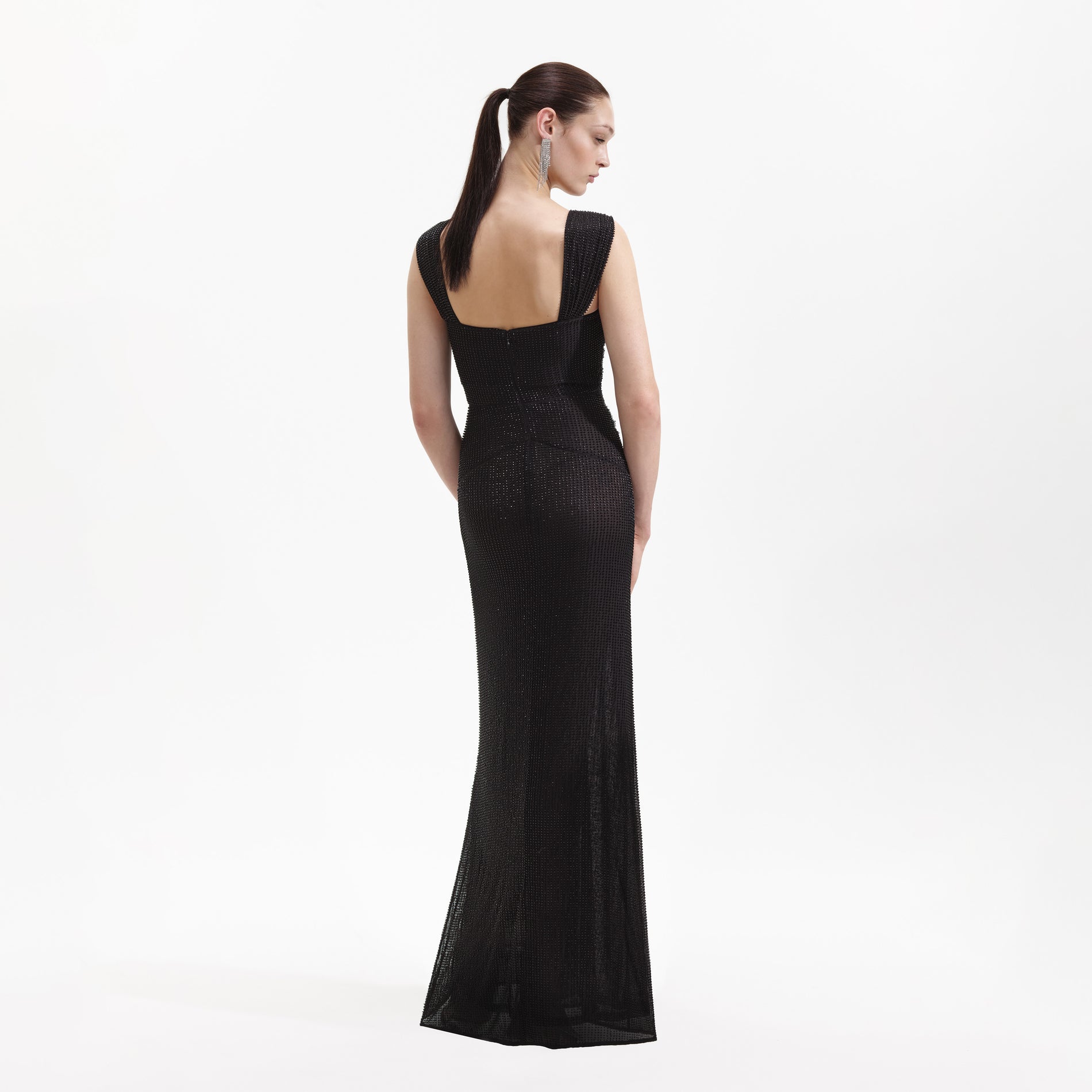 Back view of a woman wearing the Black Beaded Mesh Maxi Dress