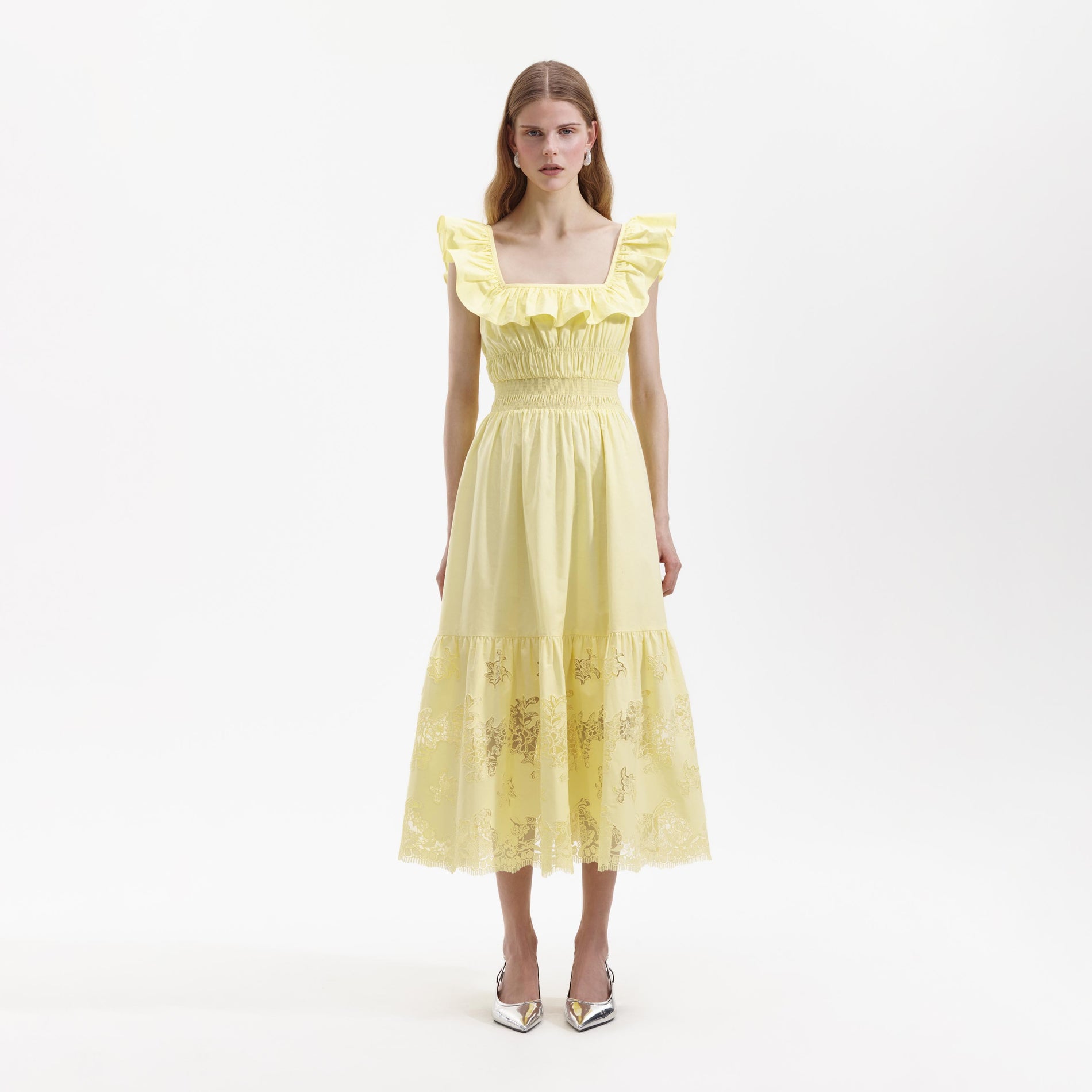 Front view of a woman wearing the Yellow Cotton Midi Dress