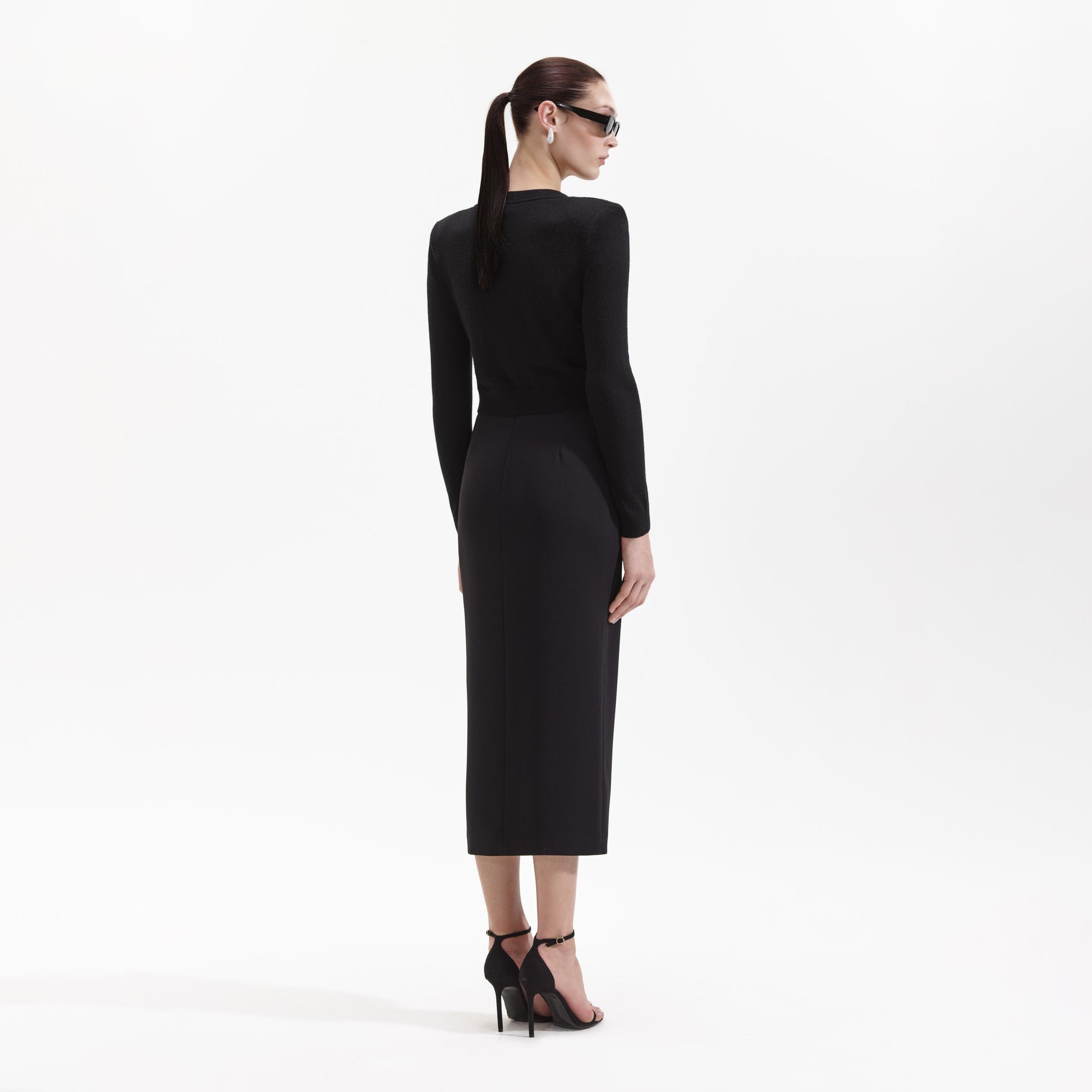 Back view of a woman wearing the Black Cashmere Blend Cardigan