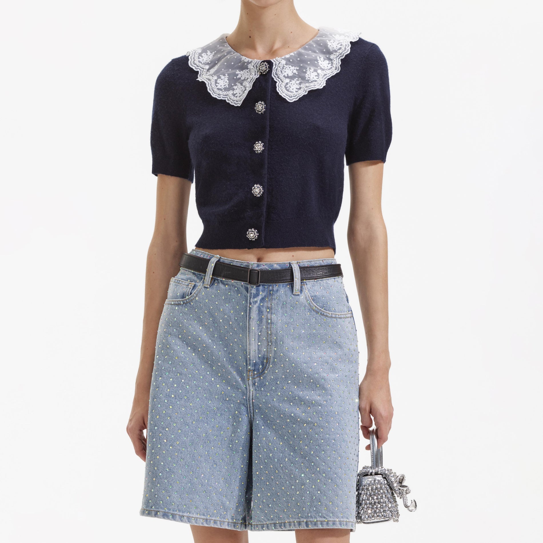 A close up of a woman wearing the Navy Cashmere Blend Collar Cardigan