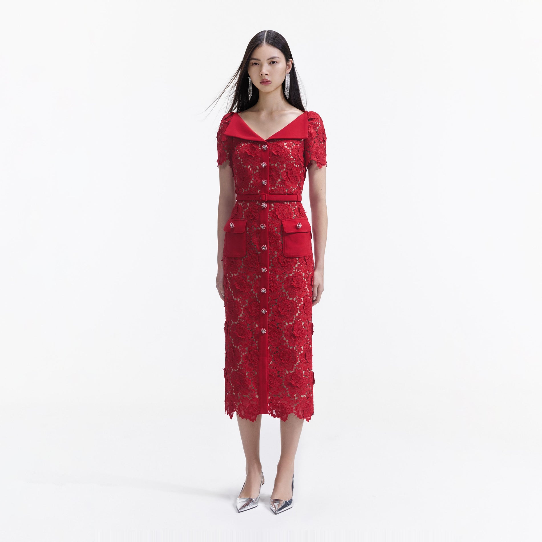 Side view of a woman wearing the Red Lace Open Neck Midi Dress