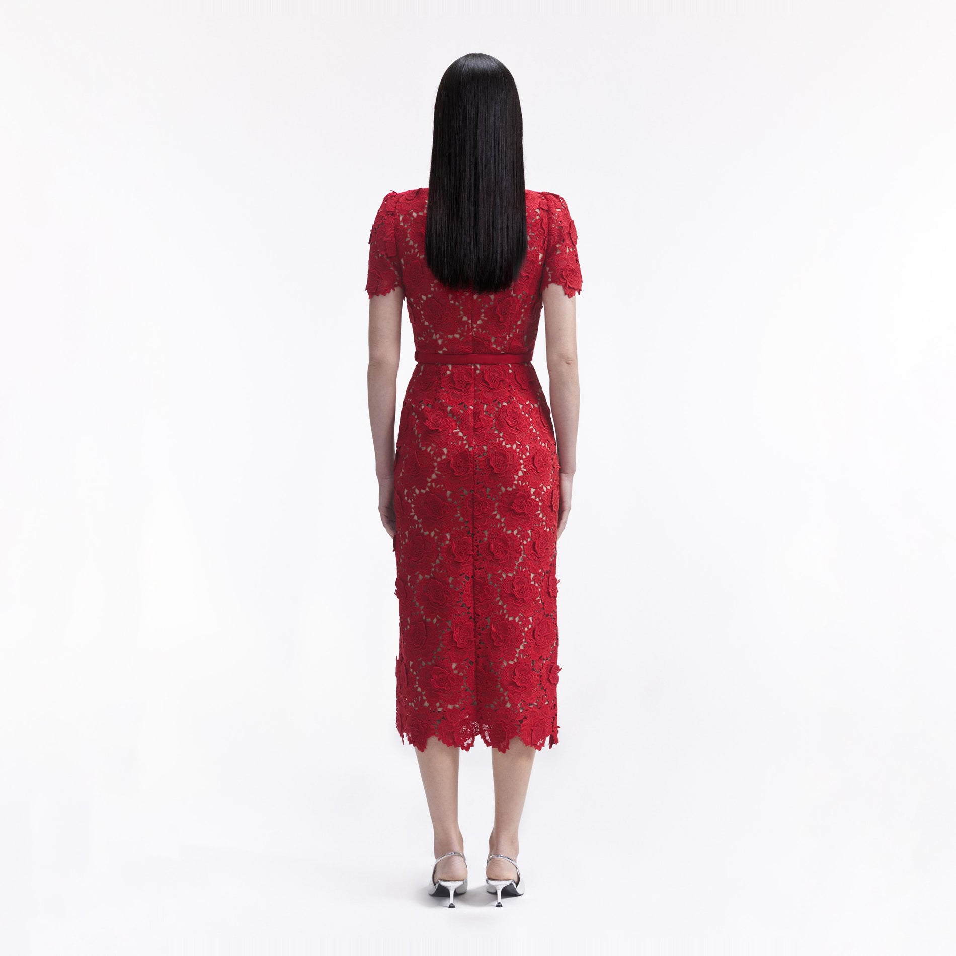 Back view of a woman wearing the Red Lace Open Neck Midi Dress