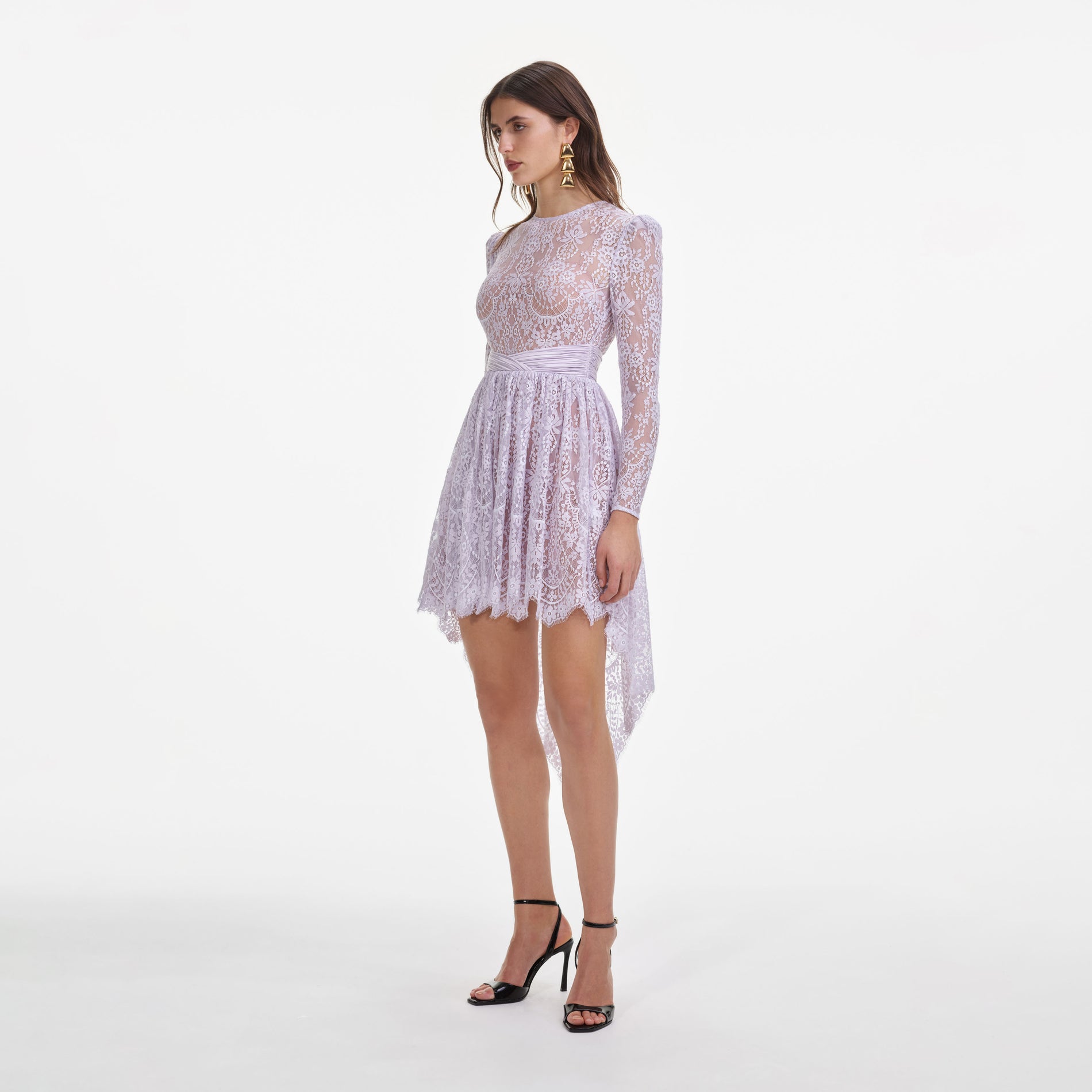 Side view of a woman wearing the Lilac Lace Satin Mini Dress