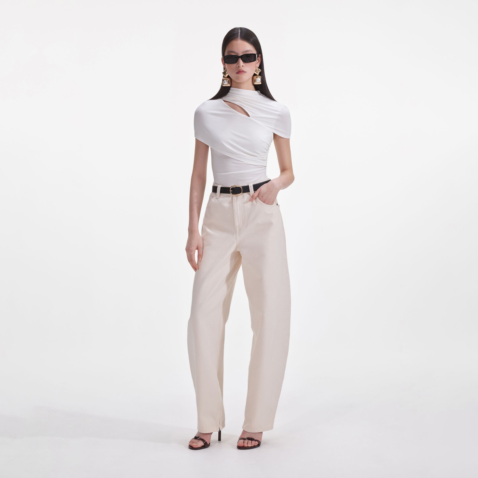 Side view of a woman wearing the Cream Jersey Gathered Top