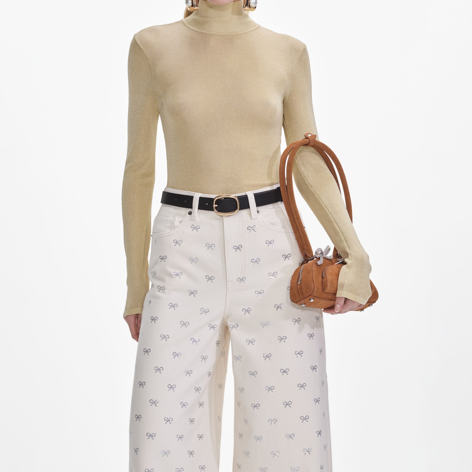 A close up of a woman wearing the Yellow Viscose Knit Top