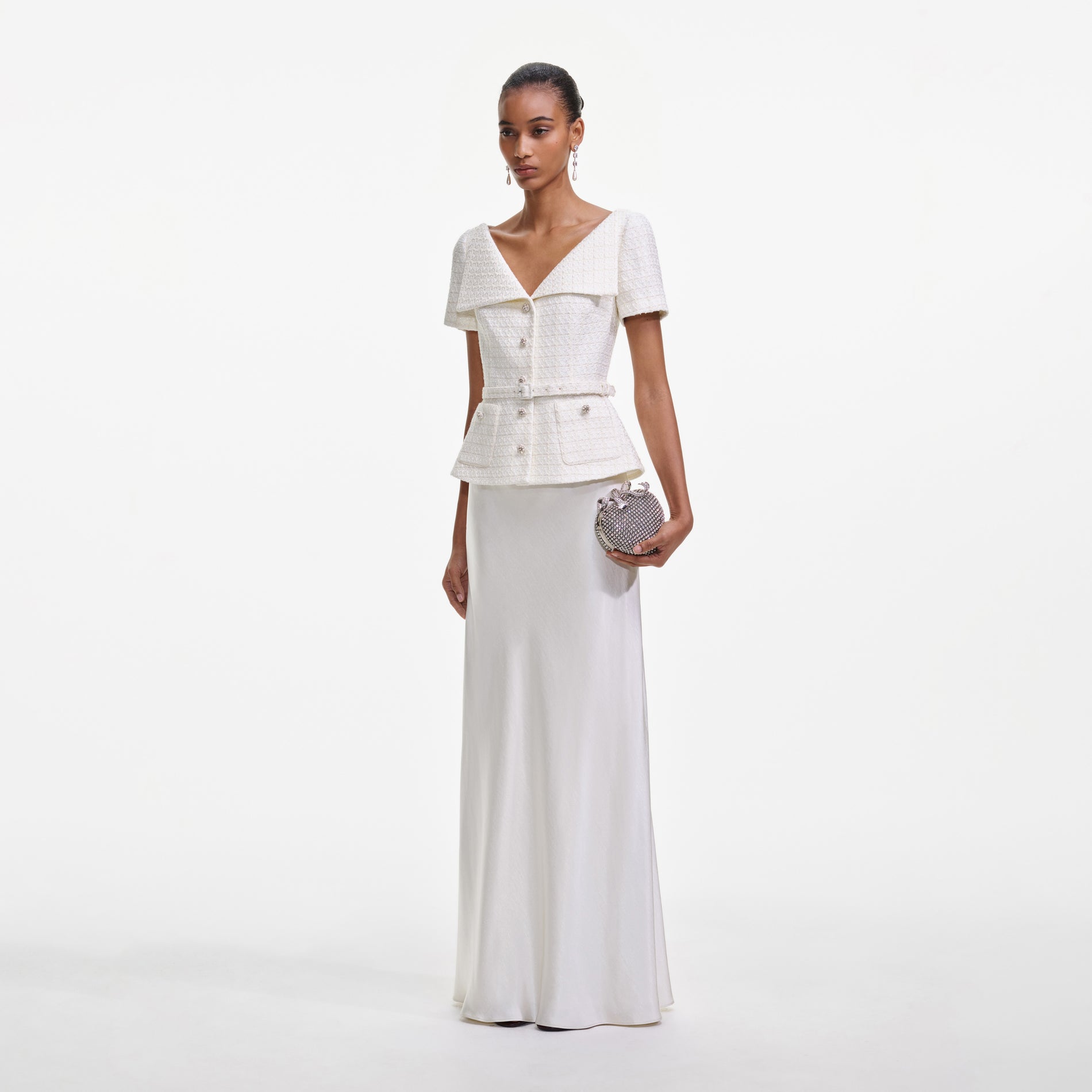 Side view of a woman wearing the Cream Boucle Tailored Maxi Dress