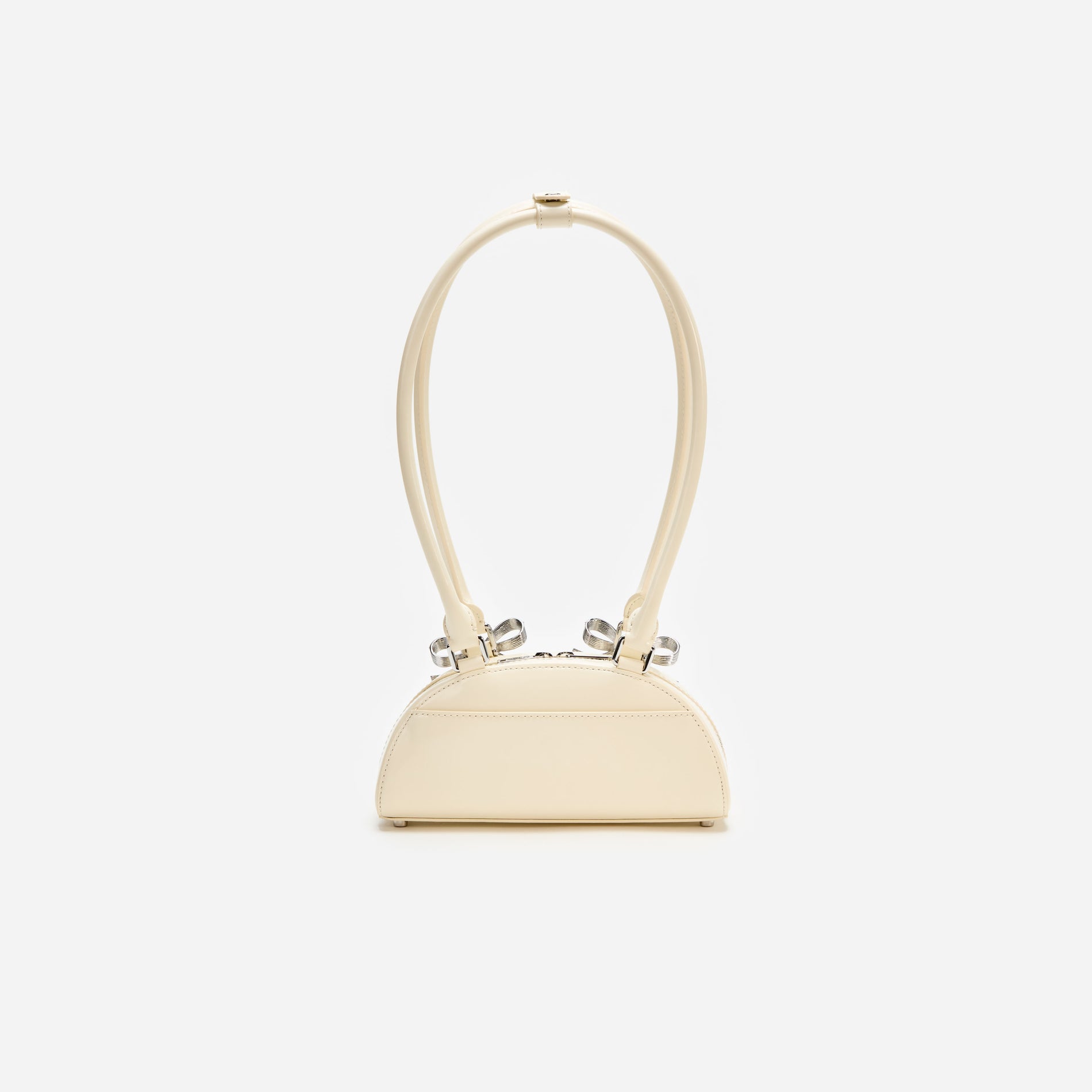 A photo of the Cream Leather Curved Mini Shoulder Bag
