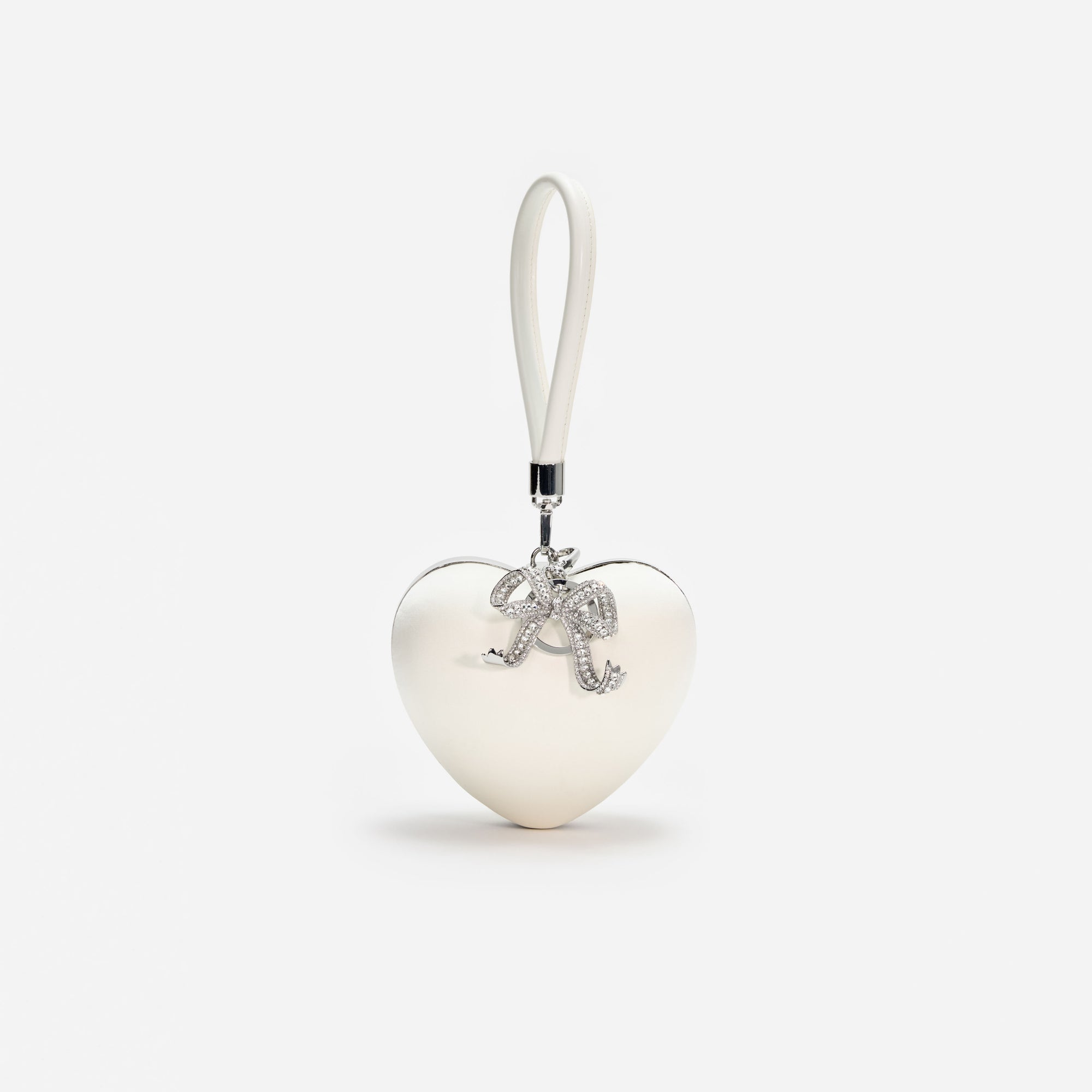 A photo of the Cream Satin Top Handle Heart Clutch