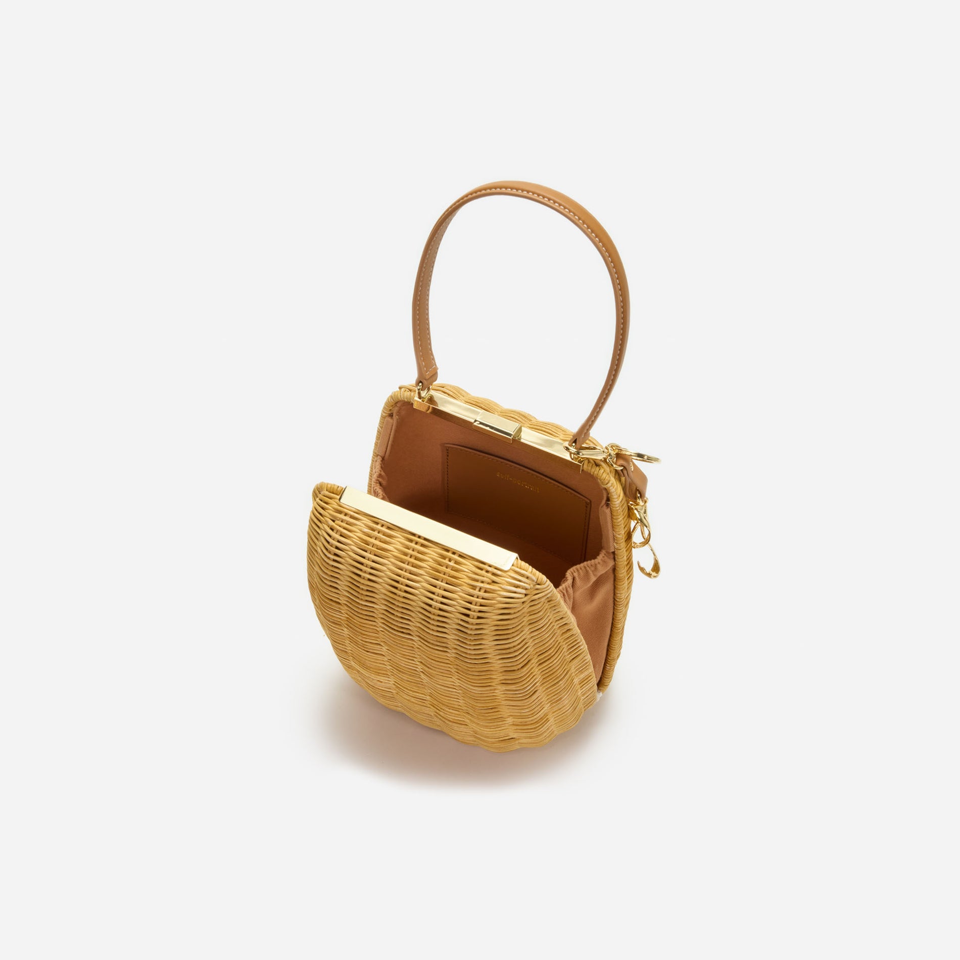 A photo of the Brown Rattan Bag With Keychain