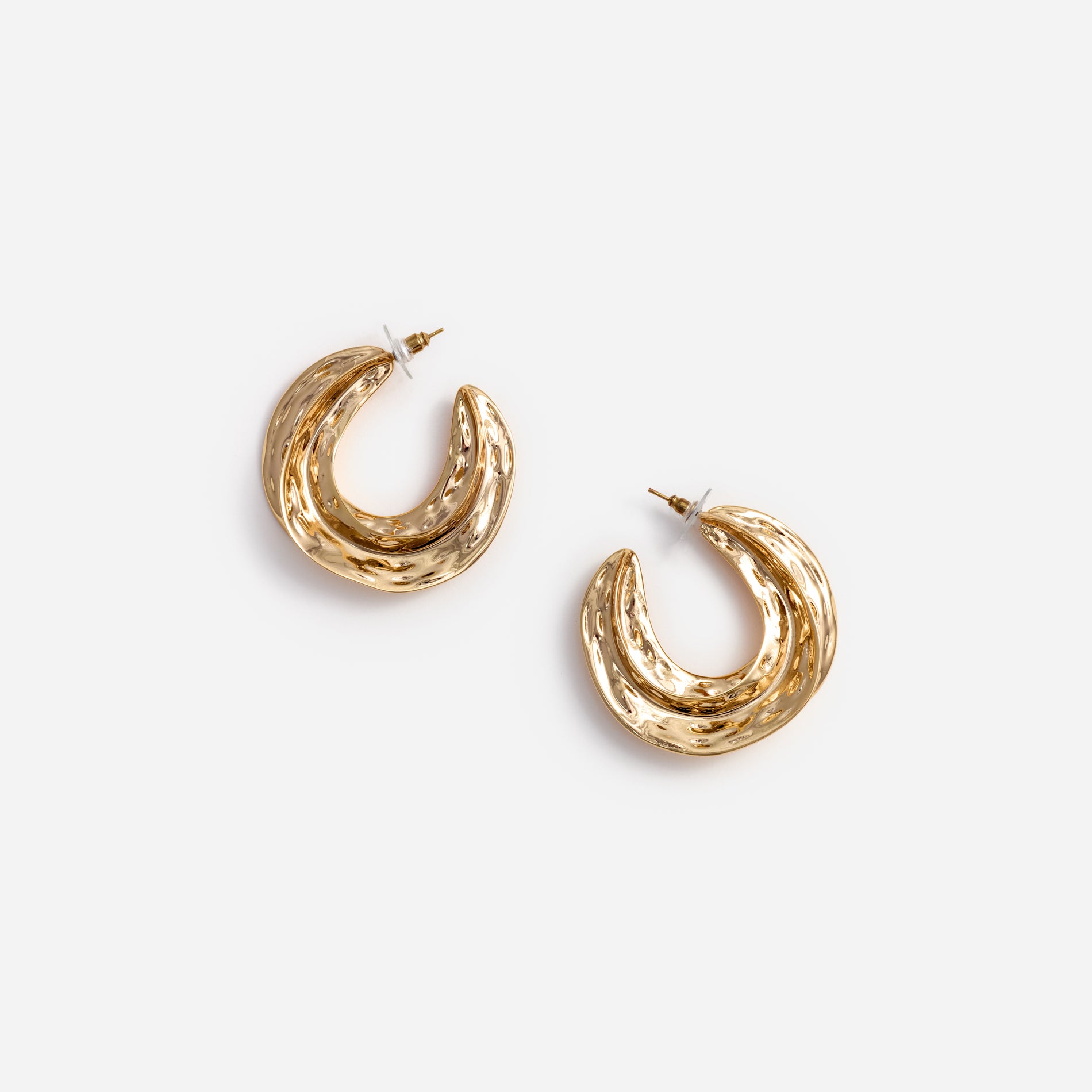 A photo of the Gold Sculpted Hoop Earrings