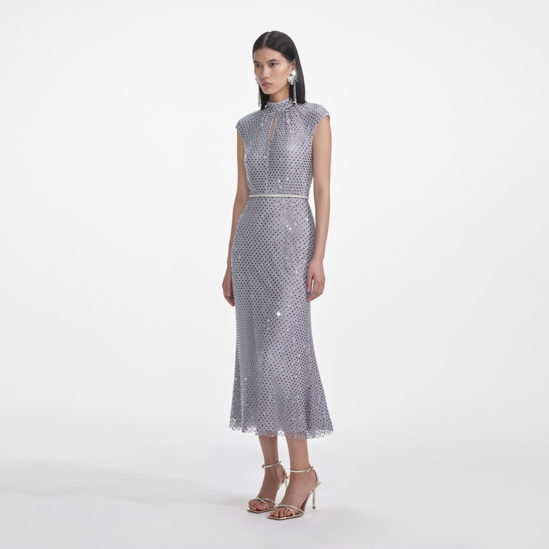 Side view of a woman wearing the Grey Rhinestone Fishnet Midi Dress