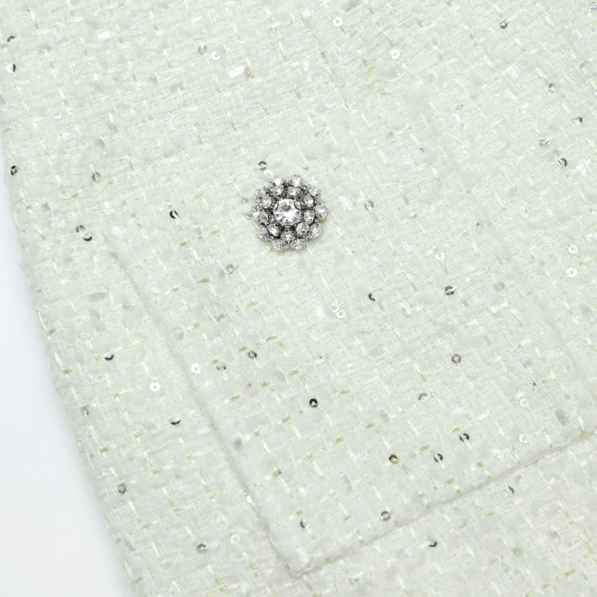 A close up of the fabric for the Lime Boucle Midi Skirt