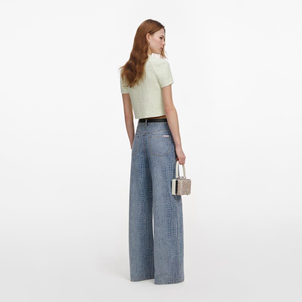 Back view of a woman wearing the Lime Boucle Top