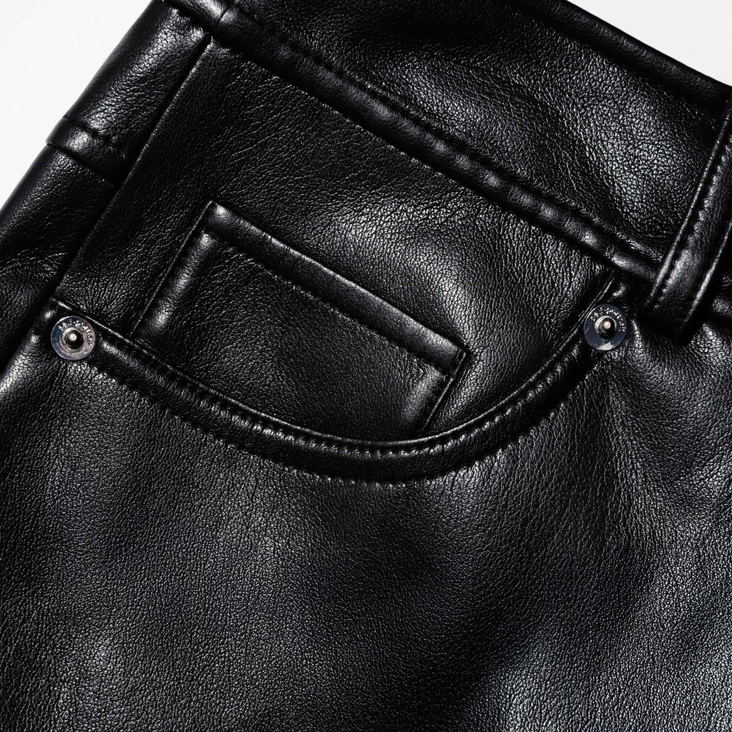 A close up of the fabric for the Black Faux Leather Shorts