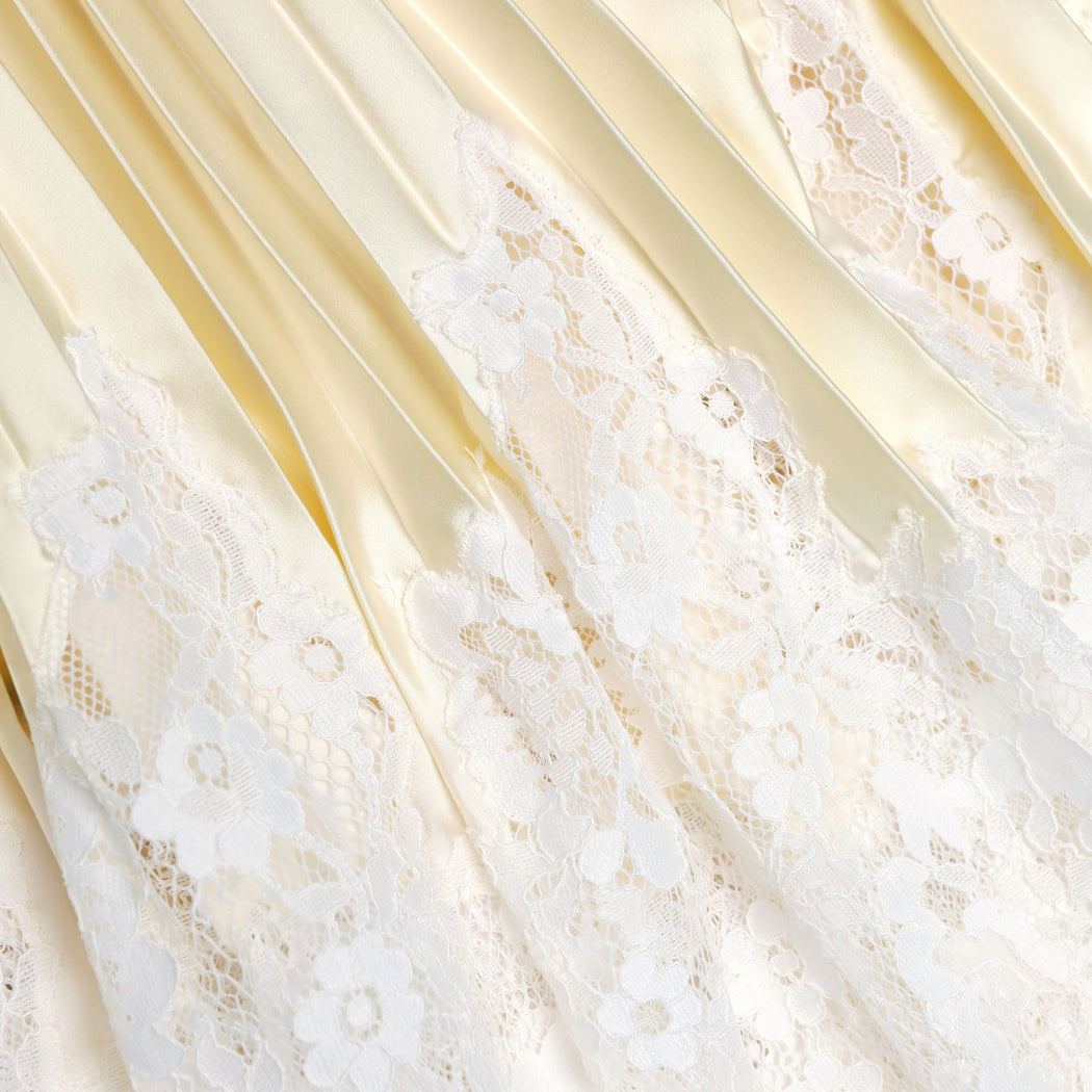 A close up of the fabric for the Yellow Satin Lace Midi Skirt