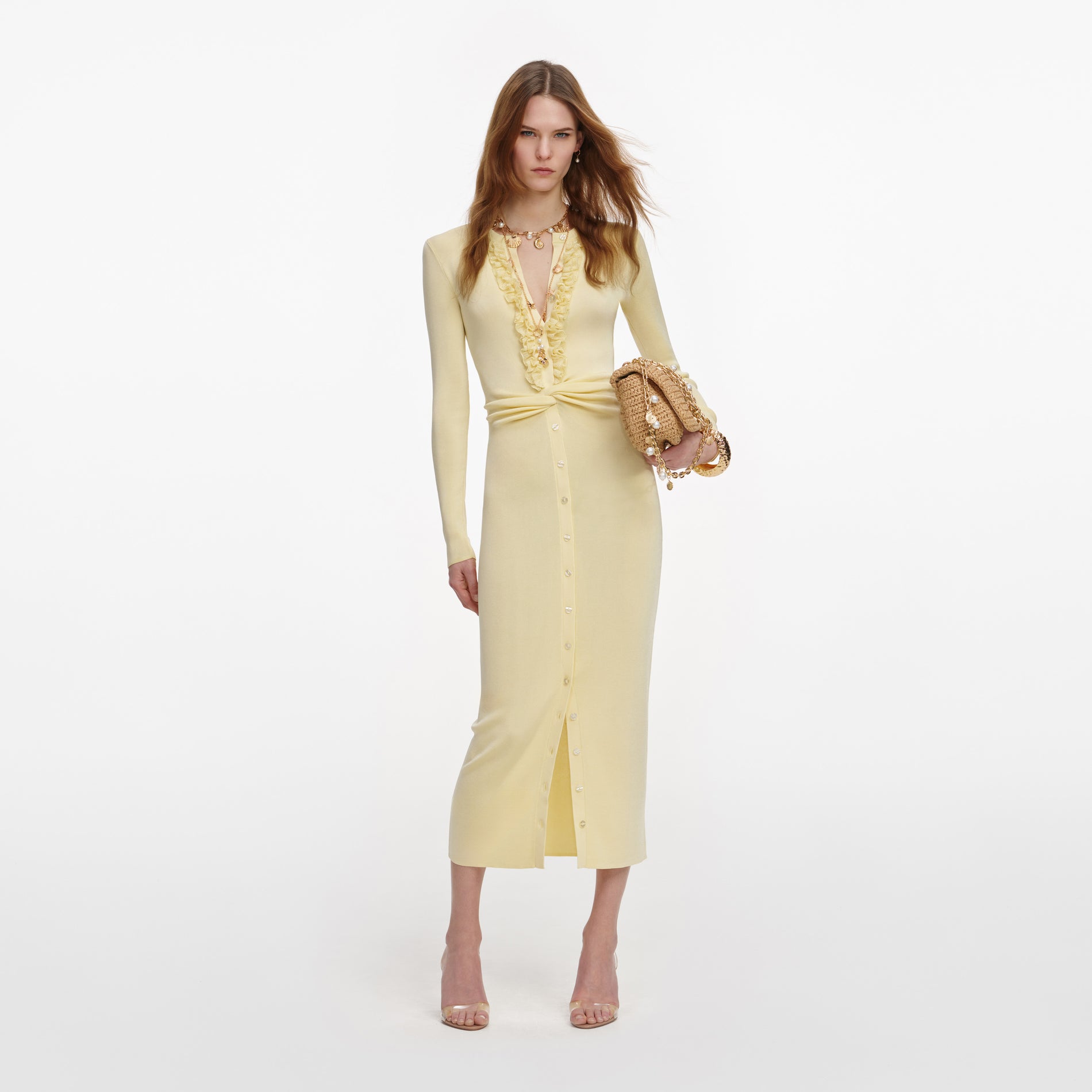 Front view of a woman wearing the Yellow Viscose Knit Ruffle Midi Dress