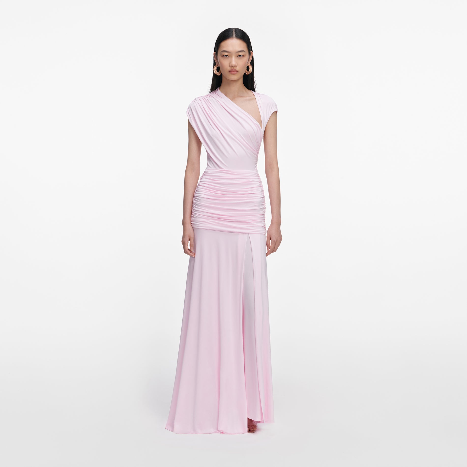 Front view of a woman wearing the Pink Jersey Draped Maxi Dress