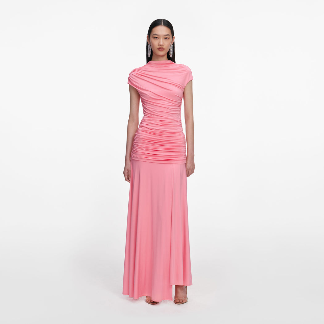 Front view of a woman wearing the Pink Jersey Gathered Maxi Skirt