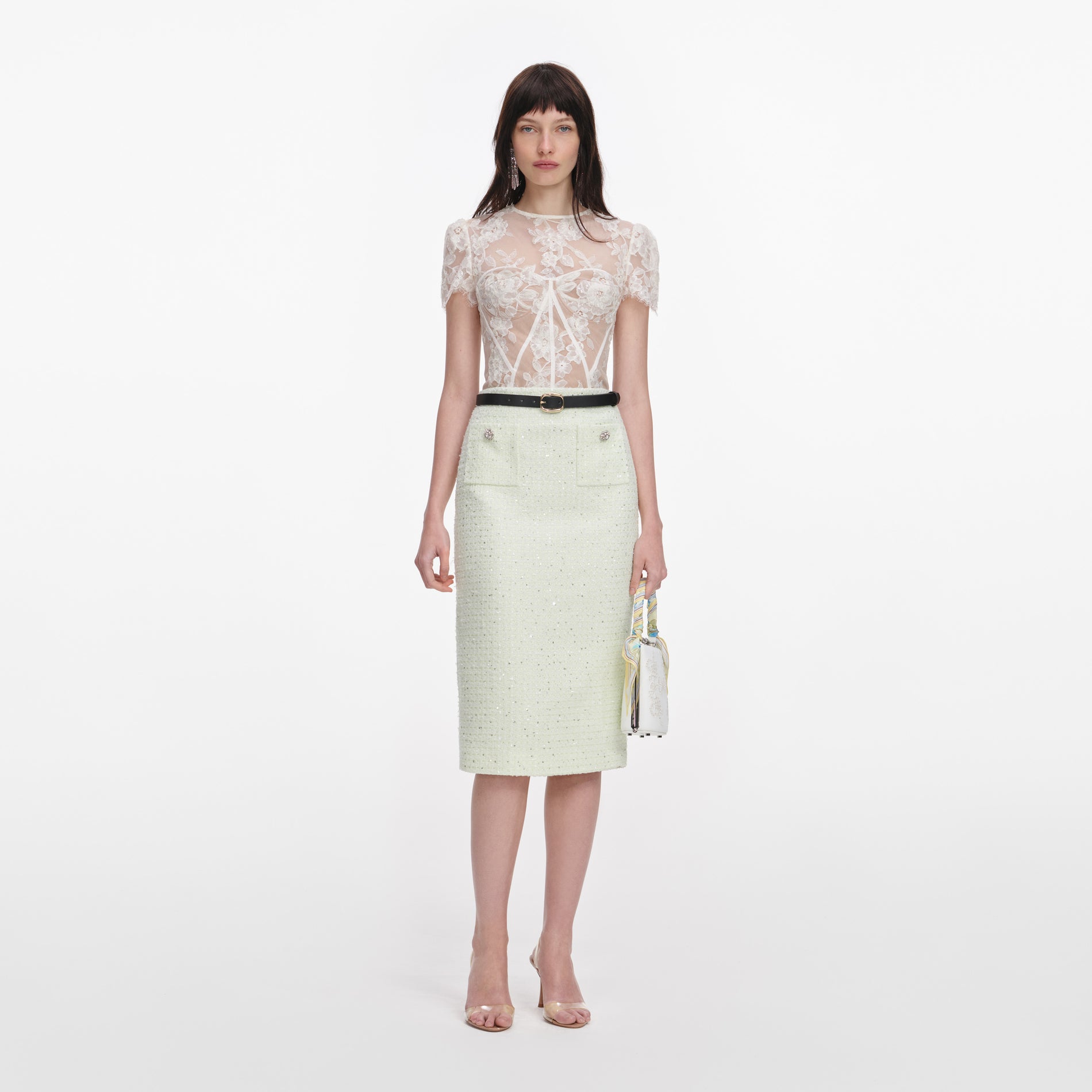 Front view of a woman wearing the Cream Sequin Lace Top