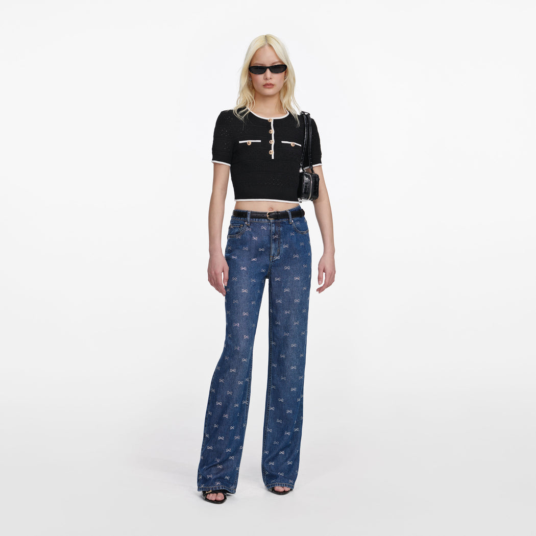 Front view of a woman wearing the Lightweight Bow Embellished Jeans