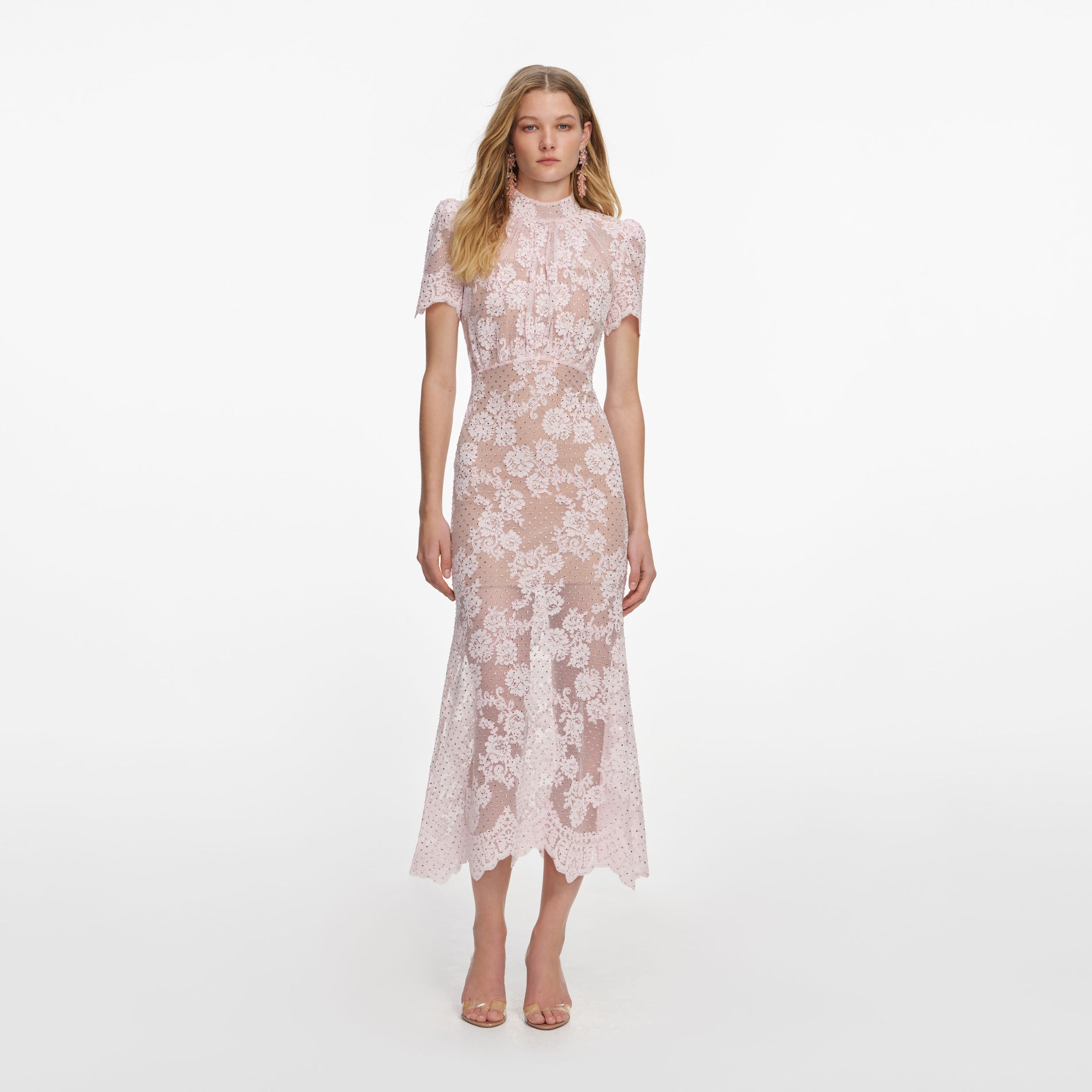 Front view of a woman wearing the Pink Rhinestone Lace Midi Dress