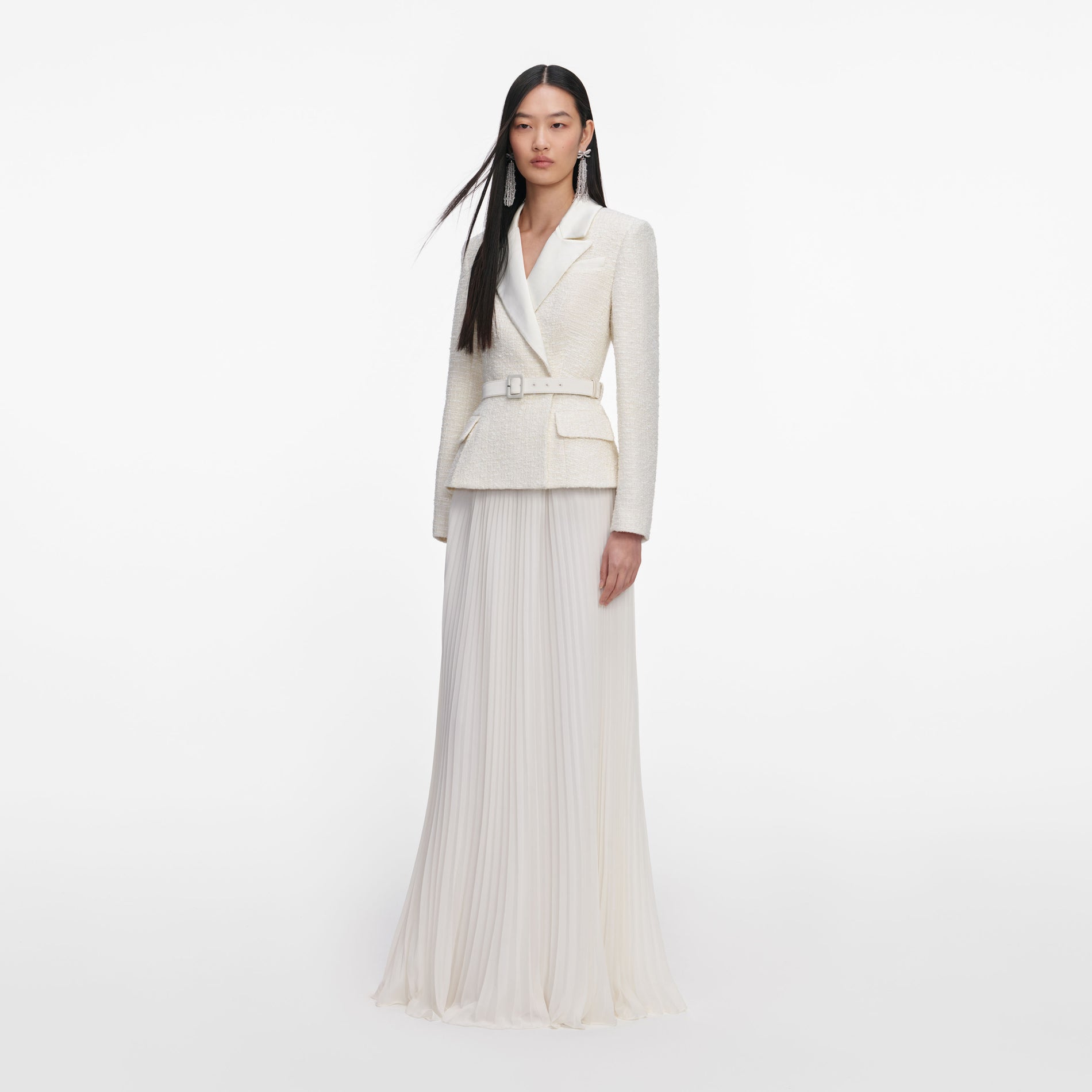 Side view of a woman wearing the Cream Tailored Boucle Chiffon Maxi Dress