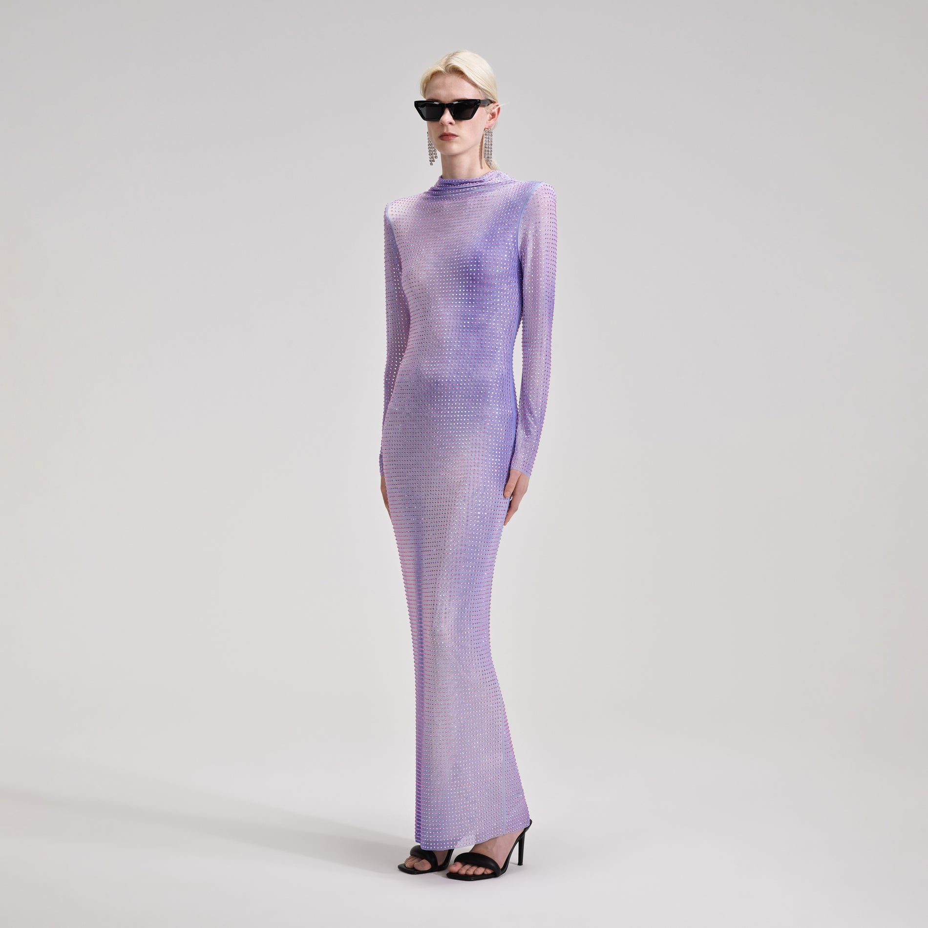 A woman wearing the Lilac Contour Print Maxi Dress