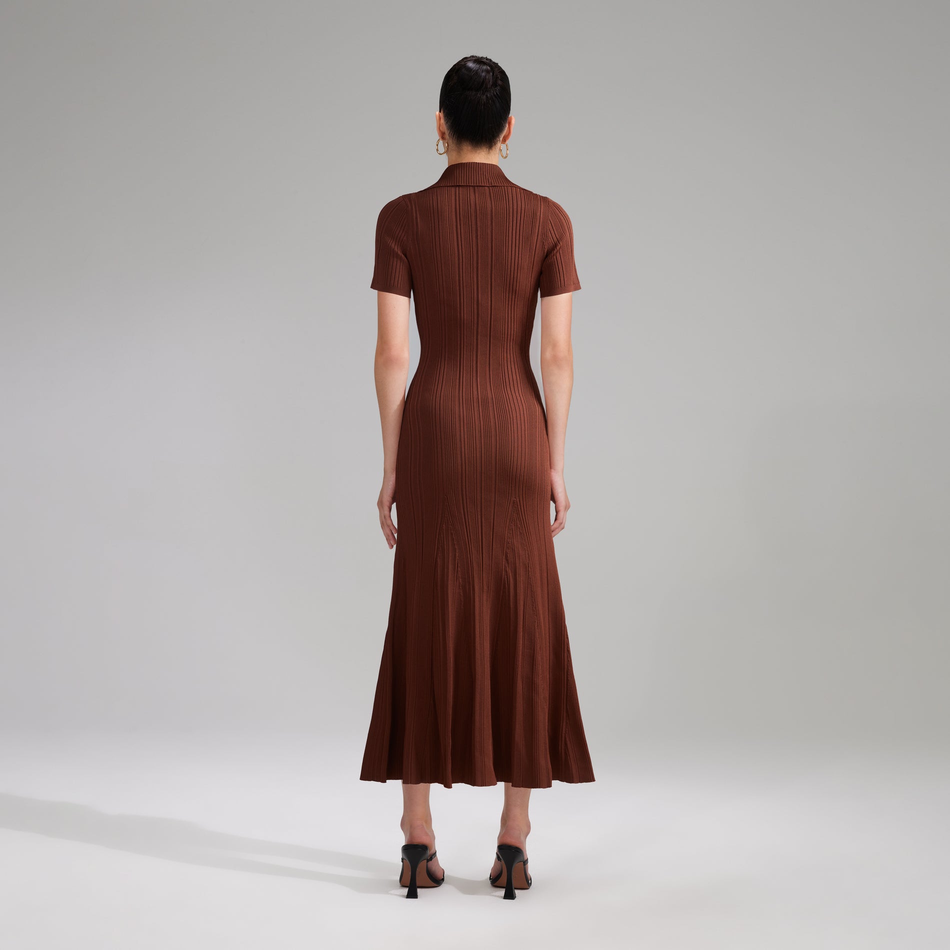 A woman wearing the Brown Viscose Knit Midi Dress