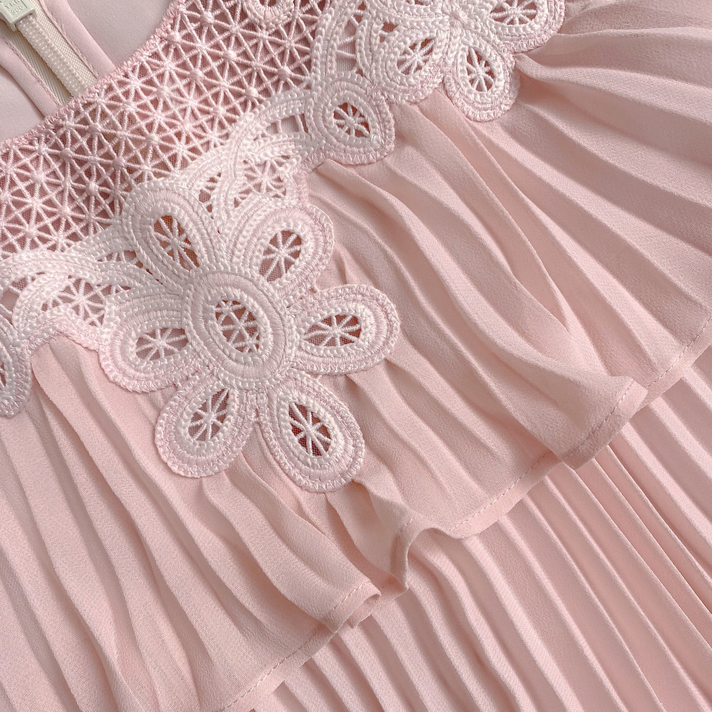 A close up of the fabric for the Pink Tiered Chiffon Dress